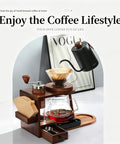 Next Level Pour Over Coffee Station And Complete Eight Piece Brewing Kit With Gooseneck Kettle Manual Ceramic Burr Grinder Large Glass Server And Solid Wood Rack for hand-brewed coffee setup.