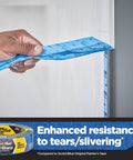 Applying PROSharp Painter's Tape 1 in x 60 yd, Edge-Lock+ tech, for sharp paint lines and 21-day clean removal on a wall.