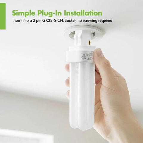Hand inserting Four Pack 13 Watt Double Tube 2 Pin GX23 2 Plug In CFL Bulb 4100K Cool White Replacement For GX23 2 Sockets into fixture