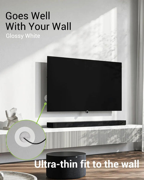 Wall Mounted TV Cable Management Kit With In Wall Pass Through And Drill Attachment, white cover in modern room.