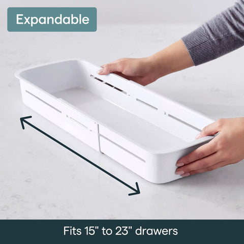 Expandable Sliding Drawer Bin For Kitchens Sets The Bar Inside Deep Drawers The Adjustable Storage Tray In Speckled White shown being extended.