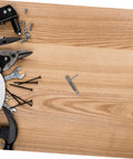 Tough Retractable Plunger Pin With Spring Return Knurled Handle Stainless Steel Indexing Safety Latch displayed among tools on wooden surface.