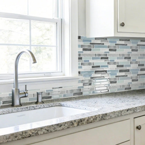 Kitchen with 10 Sheet Peel And Stick Tile Backsplash Kit In Vinyl 3D Marble Look, showcasing glossy tile behind sink and counter