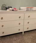 White dresser with 20Pcs Round Unfinished Wood Cabinet Drawer Knobs Pulls Handles for DIY Projects, diameter 3.6 cm height 3 cm.