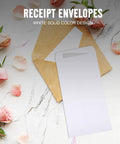 Thick White Blank Letter Envelopes 230x120mm Bulk Pack of 100 Durable Paper on a table with flowers, easy seal design