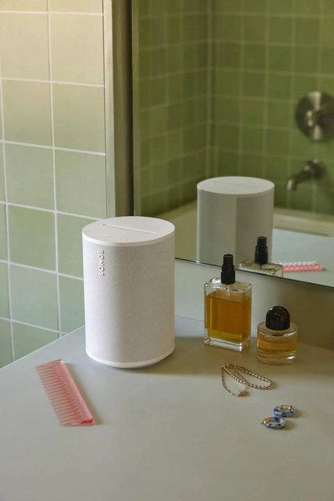 Era 100 SL Dope Compact Microphone Free Wireless Speaker With WiFi Bluetooth Line In on bathroom counter