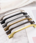 10 Pack 3 Inch Brushed Nickel Cabinet Pulls Satin Nickel Cabinet Handles For Cabinets Drawers Dressers Cupboards And Vanities With Included 1 Inch And One Half Inch Screws Durable Solid Metal Rust Resistant shown in assorted finishes on marble surface
