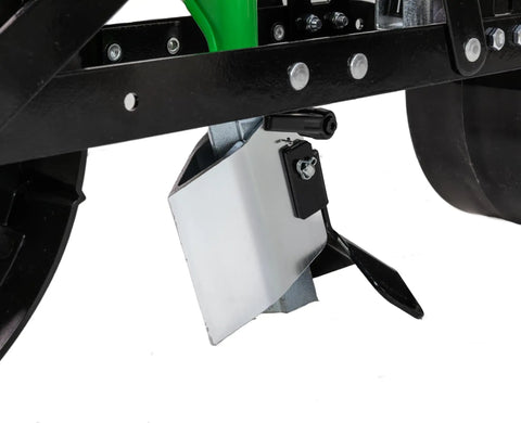 Close-up of zinc plow blade and row marker on Walk Behind Garden Push Seeder Planter With Six Seed Plates For Up To 20 Varieties