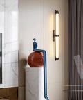JGSYD Led Modern Wall Lamp Indoor with Remote Control Wall Light 2700K-6500K Dimmable Wall Sconce Long Strip Decorative Wall Lighting Stainless Steel for Bedroom Hallway Living Room,Black-70Cm illuminated beside decorative figurine.