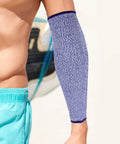 Premium Cut Resistant Arm Sleeves 2 Pack Blue Anti Cut Forearm Guards For Industrial Work Heavy Duty Job Site Hustle Legit Workshop Protection, worn on a forearm.