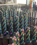 Front view of rainbow DLC-coated carbide square end mills with 1/4-inch shank and 3-flute.
