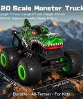 Dino Monster Truck RC With LED Lights And Roaring Sound, 1 To 20 Scale All Terrain Off Road Toy Vehicle, Green monster truck on rocky terrain.