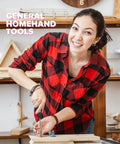Person using screwdriver in a woodworking project, wearing red plaid shirt with wooden shelves in the background.