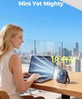 Tiny USB Desk Fan You Can Take Anywhere With Quiet 4 Speed Rechargeable Battery Powered Personal Fan beside laptop in office