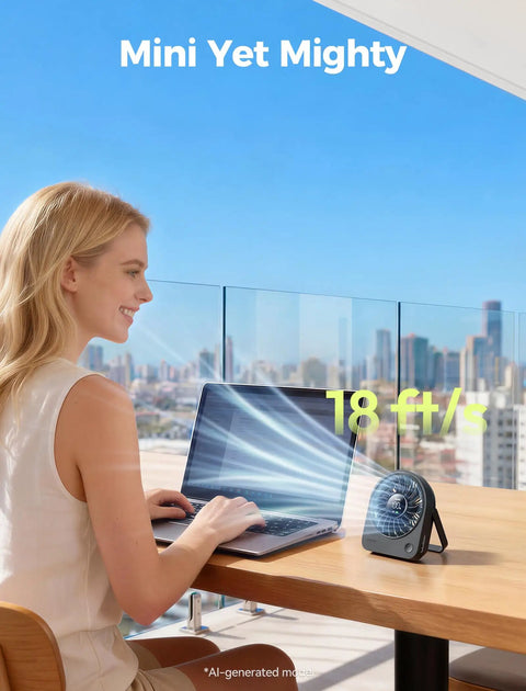 Tiny USB Desk Fan You Can Take Anywhere With Quiet 4 Speed Rechargeable Battery Powered Personal Fan beside laptop in office