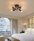 4-Light Black Semi Flush Mount Ceiling Light Fixture With Dope Industrial Farmhouse Metal Design in elegant bedroom setting