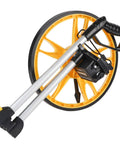 Badafaci Rolling Measuring Wheel, Foldable Handle with a yellow wheel and durable handle, ideal for precise distance measurements.