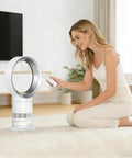 Woman using Replacement Remote Control For AM06 AM07 AM08 Fan Models 965824-01 965824-02 at home