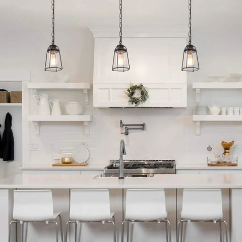 Farmhouse Pendant Lighting Mini Rustic Hanging Light With Seeded Glass Shade For Kitchen Island Foyer Hallway Bedroom Or Entryway In Bronze Finish Open Air Lantern Design For Cozy Rustic Vibe, shown hanging over a white modern kitchen island