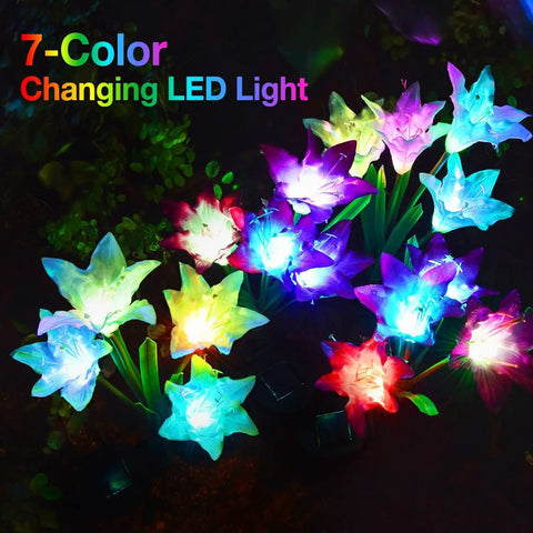 4 Pack Outdoor Solar Lights With Bigger Lily Flower Designs, Waterproof 7 Color Changing LEDs glowing in garden at night