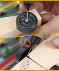 Pinewood Derby Car Weights Kit With 12 Weights In Two Sizes And Graphite Powder Lubricant For Wheels And Axles Four Ounce Total Weight Plus Half Ounce Lubricant Ideal For Faster Smoother Derby Races being applied to wheels and axles of a derby car.
