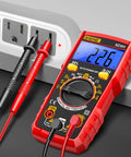 All In One Digital Multimeter Tester for Home Auto and DIY Projects measures voltage, shown testing outlet in red.