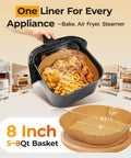 8 Inch Square Air Fryer Liners Disposable Parchment Paper in black basket with chicken and fries, fits 5 to 8 Qt ovens.