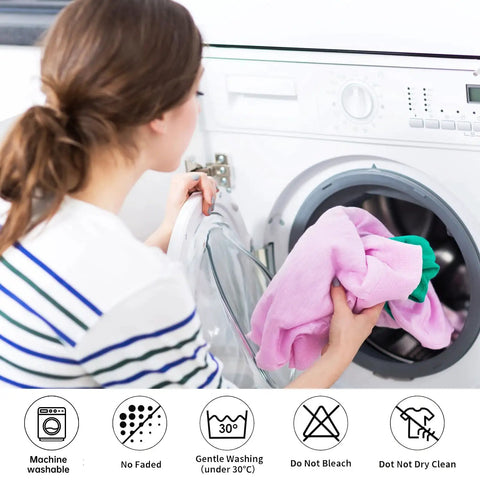 Woman placing Steam Train Locomotive Lightweight Fleece Blanket in washing machine, showing machine washable feature.