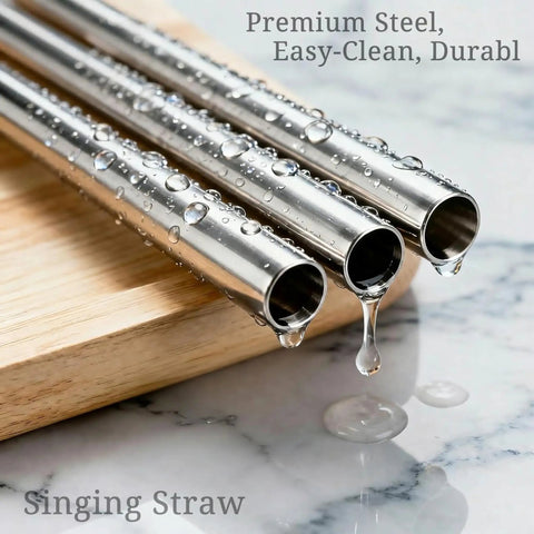 Three silver metal straws with water droplets from Pro Grade Singing Straw Vocal Trainer Kit With 4 Metal Straws, Cleaning Brush And Bamboo Travel Tube
