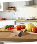 Real Deal Silicone Cutting Board Oil Wax Applicator Brush For Zero Hassle Kitchen Maintenance And Wooden Utensil Care Food Grade Mineral Oil Finishing Tool Smooth Operator No Rush Setup on a kitchen counter with fresh vegetables.