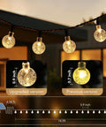 Close-up of Solar String Lights For Outdoor 20Ft 30 LED Crystal Globe Fairy Lights Warm White With 8 Lighting Modes on patio