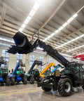 Heavy Duty Four Wheel Drive Telehandler Forklift With Extended Reach Boom in warehouse showing hydraulic boom and bucket.
