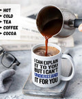 Funny Engineer Coffee Mug I Can Explain It To You But I Cant Understand It For You Gift For Engineers Teachers Managers Coworkers Boss Doctors 11 Oz Ceramic Coffee Mug For Home Office Desk Humorous Techie Gift shown with coffee being poured next to glasses and grey wool gloves.