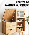 Wooden cabinet with open lid supported by Locking Chest Hinges With Soft Close For Toy Boxes And Cabinets, Heavy Lid Support