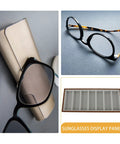 Keep Your Shades Neat In This Slick Wooden Sunglasses Holder Tray Featuring Plush Gray Velvet Lining And Seven Roomy Slots For Secure Eyewear Organization At Home. Stylish sunglasses displayed above a wooden organizer.