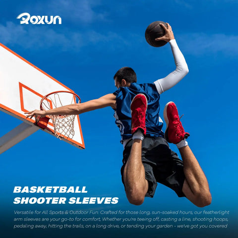 Basketball player wearing a cooling arm sleeve, mid-dunk, showcasing Cooling Arm Sleeves With UPF Fifty Plus Sun Protection For Men And Women Seamless Sport Compression For Outdoor Activities Like Running Cycling Hiking And More