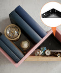 Four Pack Corner Brackets 66mm By 66mm Right Angle Shelf Braces in black metal used in wooden shelf design with decor