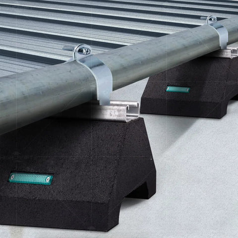 Rooftop Pipe Support Block With Galvanized Steel Strut For Conduit And HVAC Workhorse Sleeper Curb Replacement 750 Pound Capacity Five And Three Quarters Inch By Ten Inch Block Recycled Rubber Black installed on flat roof