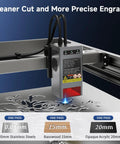 Close-up of Falcon2 Pro 22W Enclosed Laser Engraver With Air Assist And HD Camera Positioning engraving metal surface.