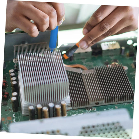Person using Two Piece Manual Desoldering Pump Solder Removal Tool Suction Gun For PCB Durable Solder Sucker on circuit board