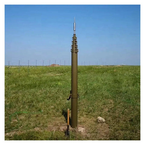 Pro Grade Manual Telescopic Aluminum Mast Expands From Two Point Five Meters To Ten Meters on grassy field with blue sky.