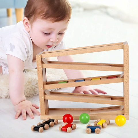 Toddler playing with Wooden Race Track Ramp Toy For Toddlers 5 Level Car Ramp Set With 4 Wood Cars And 3 Balls, no assembly