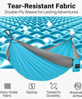 Camping Hammock With 400 Lbs Capacity Portable Hammock With Tree Straps And Attached Carry Bag Essential Outdoor Gear For Camping Hiking Beach Travel And Backpacking shown in blue double-ply fabric emphasizing durability and strength features.