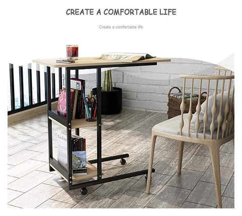C Shaped Bedside Table With Heavy Duty Wheels And Locks Height Adjustable Laptop Workstation with books and drink.