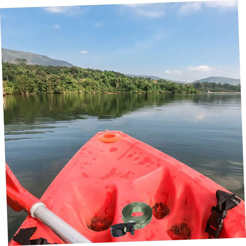 Kayak on lake with heavy duty kayak roof rack straps, quick buckles, durable aluminum zinc and polyester construction