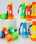 30 Piece Mini Flashlight Set With Lanyards Batteries Included Bright Colorful Handheld Torches For Kids Camping Hiking Gift Party Favors Ultra Portable Pocket Size Lighting Kit, featuring 3.1 inch orange, blue, yellow, and green flashlights