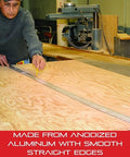 Person using Go-To 72 Inch Aluminum Straight Edge Rule For Shops And Schools Pro Woodworkers And Metalworkers Trust on wood plank.