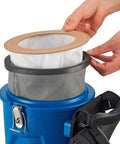 Hand replacing filter in Ergonomic HEPA Backpack Vacuum With 8 Piece Tool Kit 2.5 Gallon Capacity 105 CFM 1080W 120V 50 Foot Power Cord