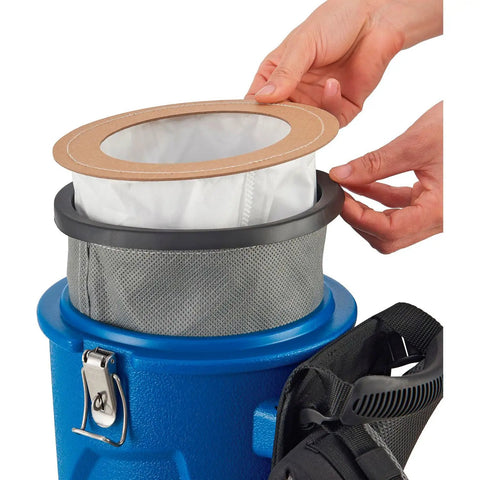 Hand replacing filter in Ergonomic HEPA Backpack Vacuum With 8 Piece Tool Kit 2.5 Gallon Capacity 105 CFM 1080W 120V 50 Foot Power Cord