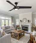 56" Farmhouse Reversible Ceiling Fan Light with Dark Gray ABS Blades installed in a bright, airy living room with a fireplace.